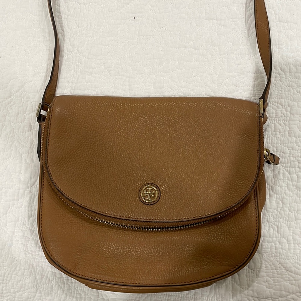 Tori Burch moose colored purse.